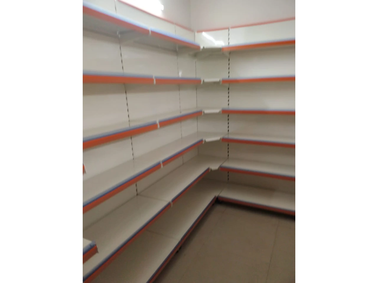 886870451_Corner display racks installation Lucknow.webp